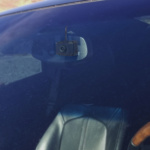 The Fly ICU Car Camera Mini Dash Cam - installed on rear view mirror
