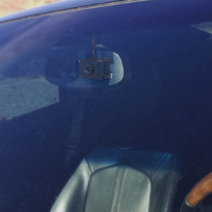 The Fly ICU Car Camera Mini Dash Cam - installed on rear view mirror